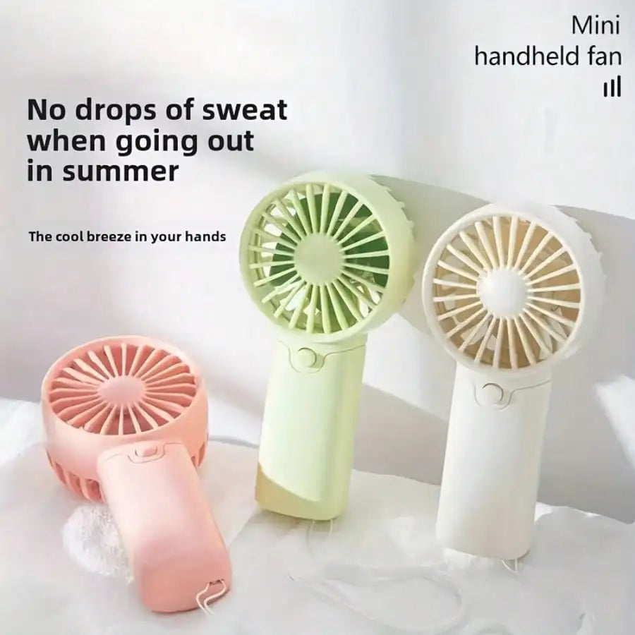 Compact Handheld Fan - Portable, Battery-Powered Personal Cooling Device